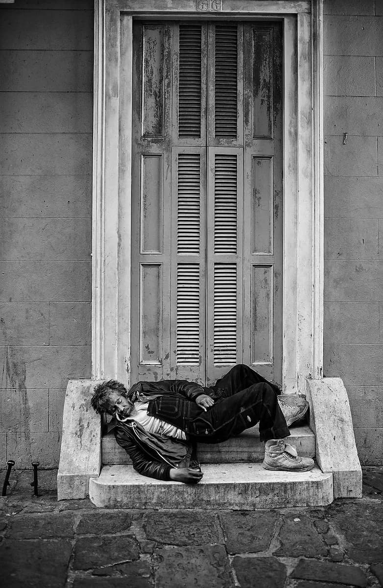 Silent Struggles: A Portrait of Resilience in Urban Shadows