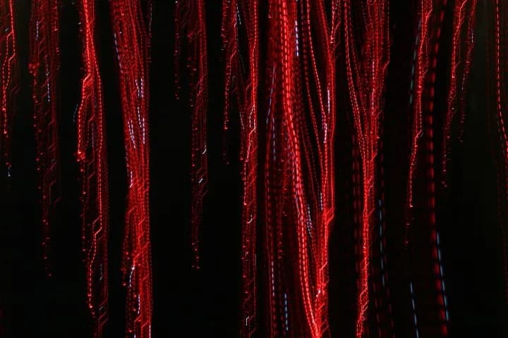Crimson Cascades: A Dance of Light and Shadow