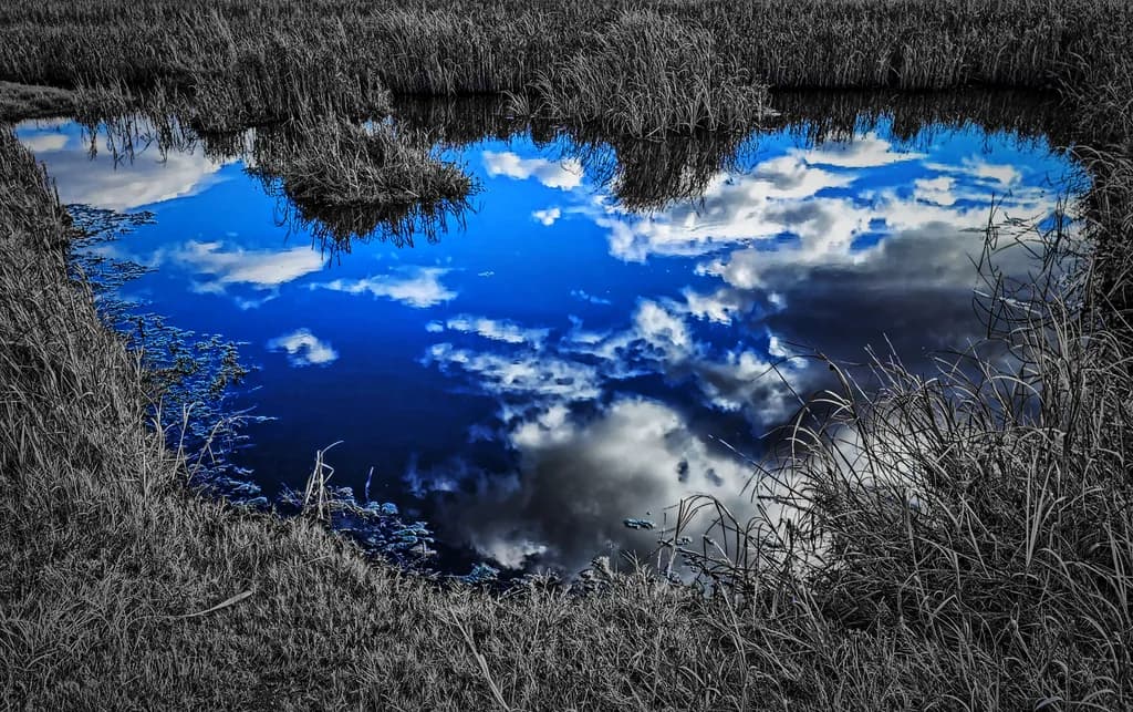Serene Reflections: A Tranquil Dance of Sky and Water