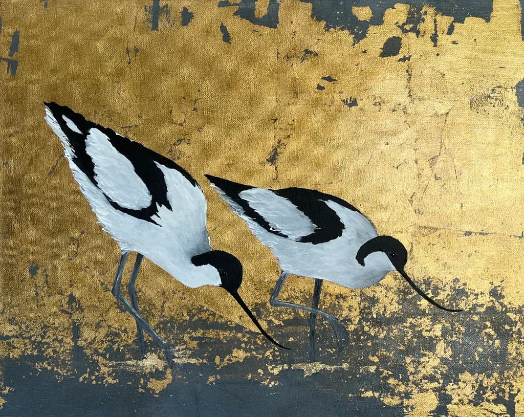 Golden Shoreline Elegance: Two Avocets in Harmony