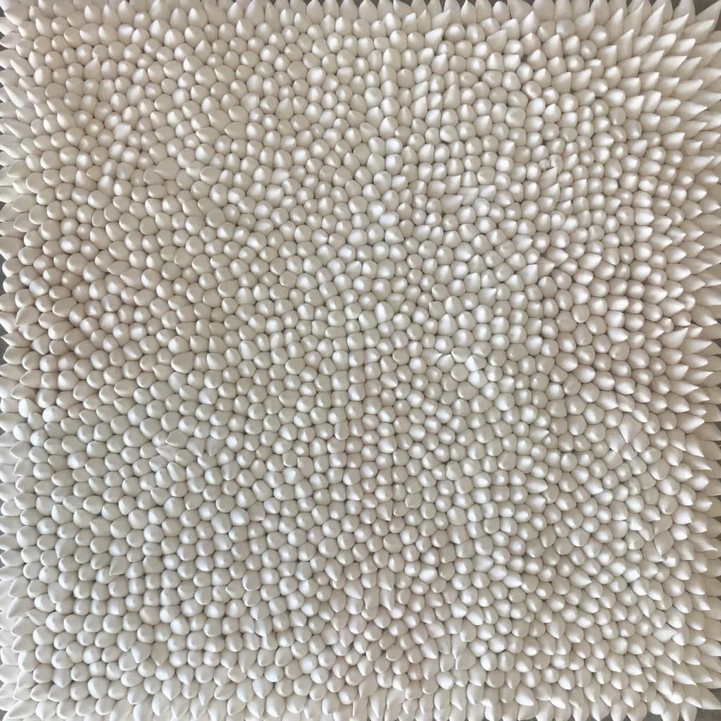 Textured Harmony: A Dance of White Forms in Contemporary Art