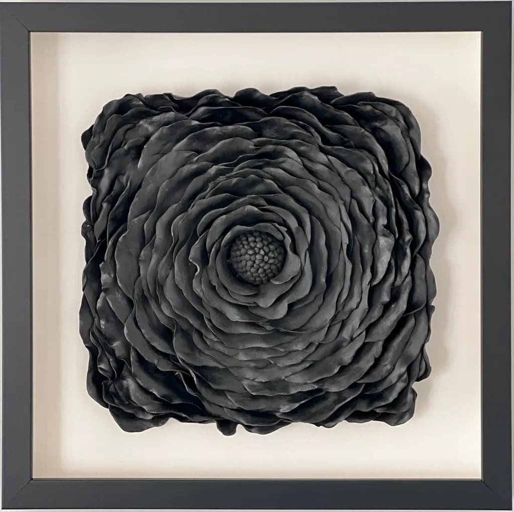 Elegant Black Blossom: A Textured Floral Sculpture for Modern Decor