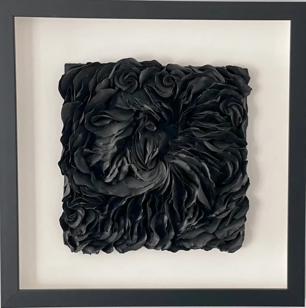 Ethereal Whispers: A Textured Journey Through Black Abstract Sculpture