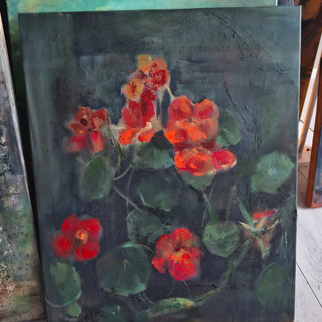 Vibrant Blossoms: A Dance of Red Flowers Against a Dark Canvas