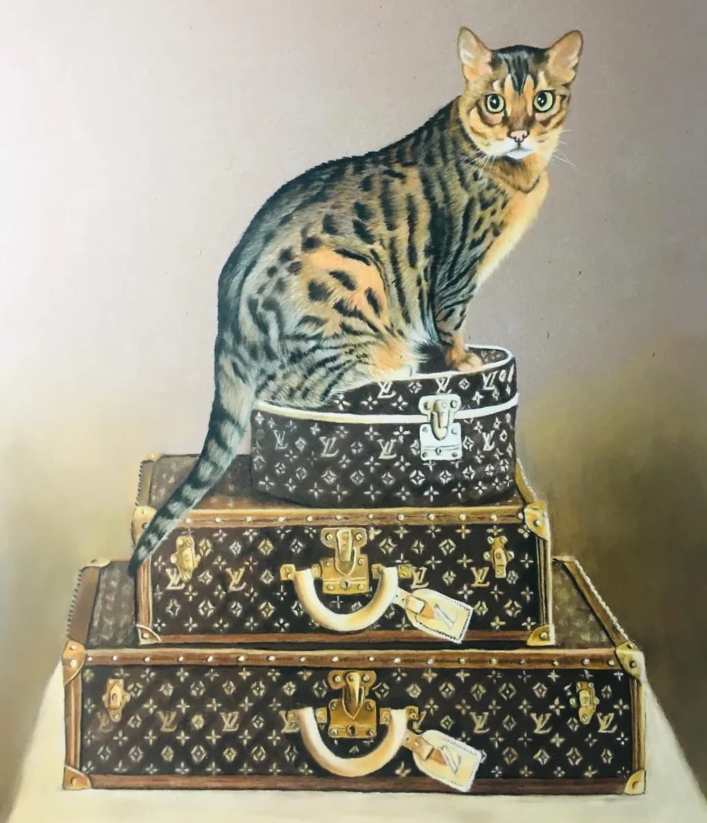 Whiskered Wanderlust: A Playful Cat atop Stylish Luggage in Elegant Harmony