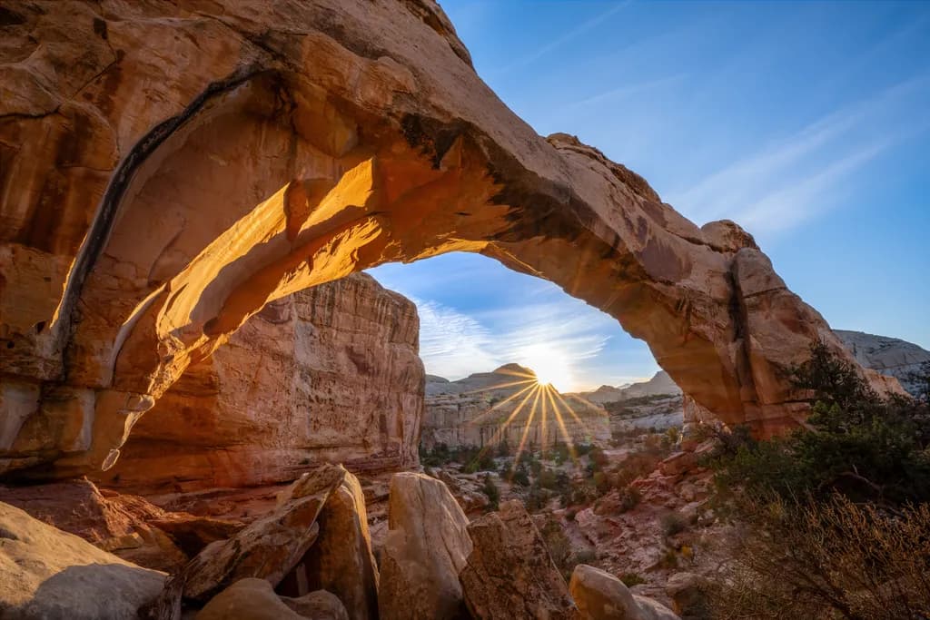 Sunrise Serenity: The Majestic Arch Illuminated by Dawn's Embrace
