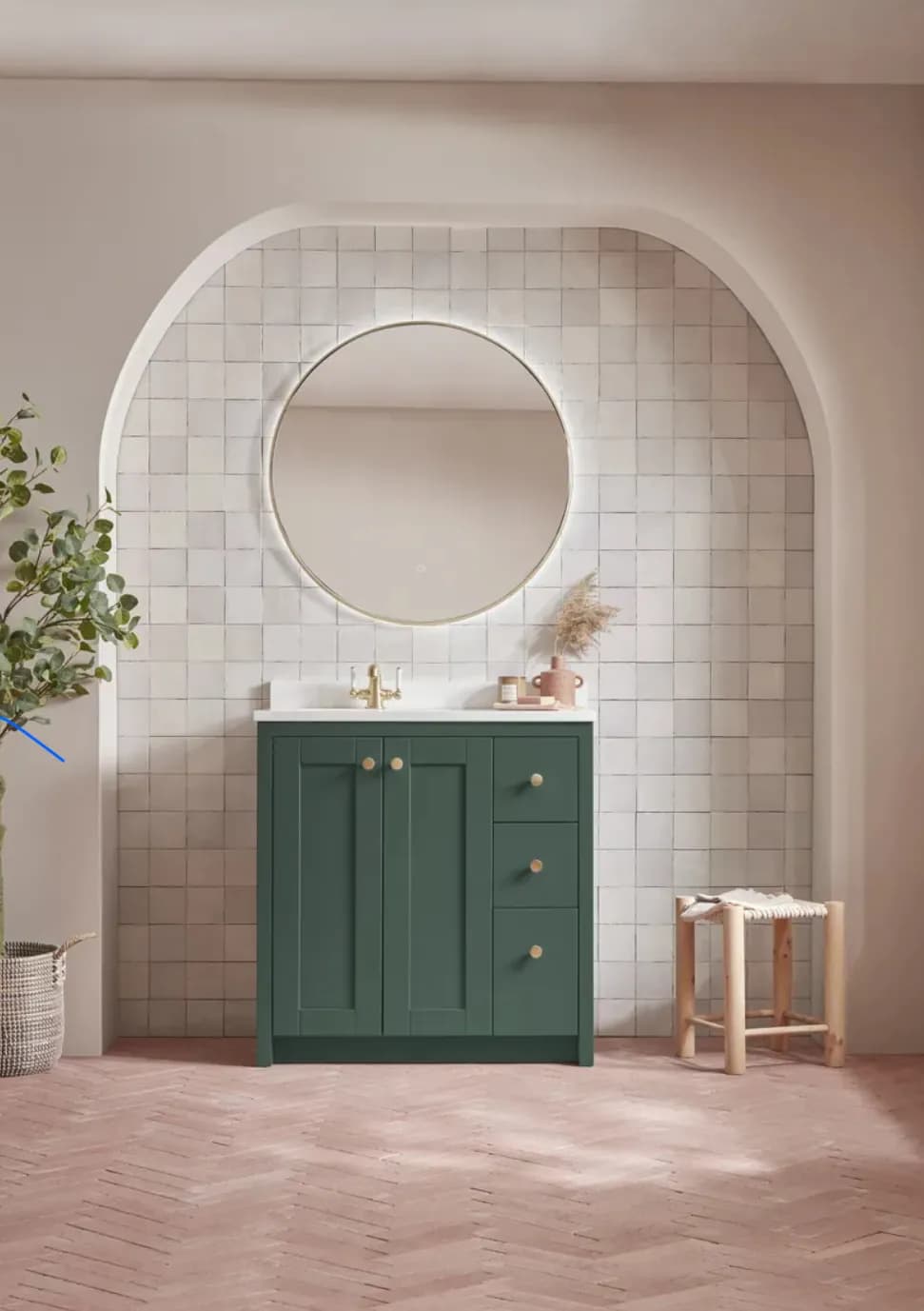 Elegant Green Vanity with Round Mirror and Textured Tile Backdrop