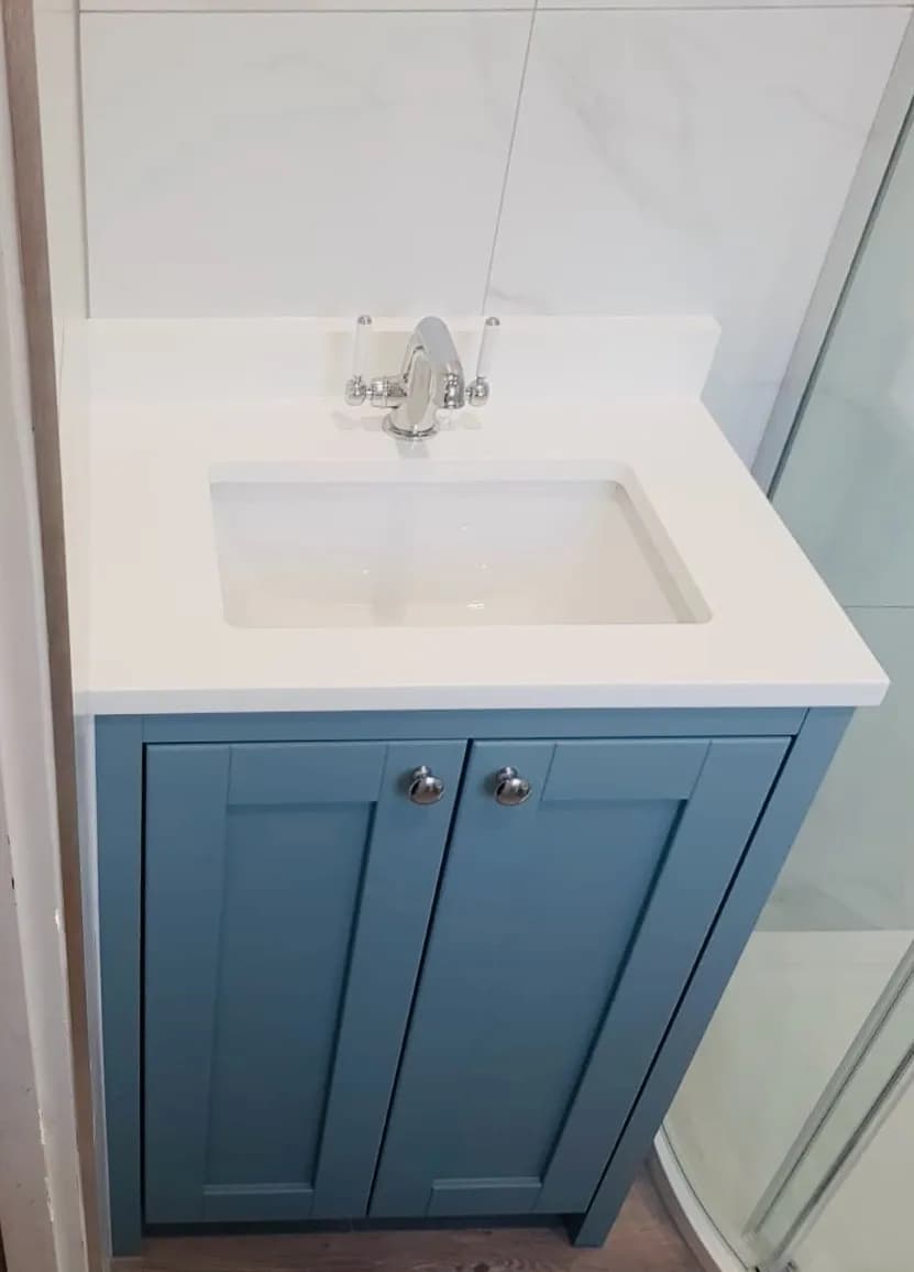 Chic Coastal Elegance: Blue Vanity with White Countertop for Modern Bathrooms