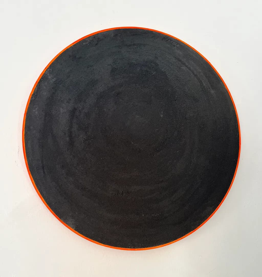Black Circle with Orange Rim