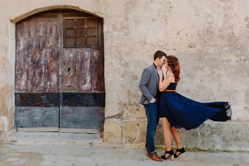 Whispers of Love: A Romantic Embrace Against Timeworn Walls
