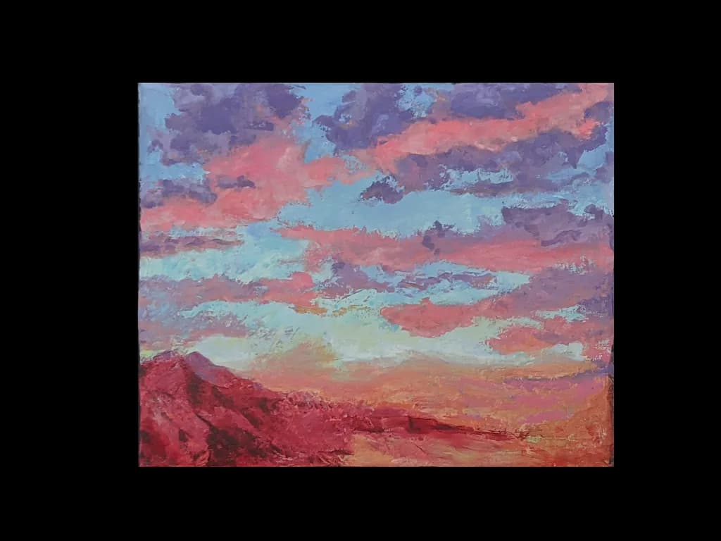 Whispers of Dusk: A Vibrant Sunset Over Majestic Mountains