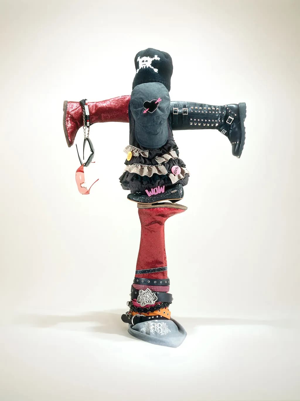 Eclectic Elegance: A Playful Fusion of Fashion and Artistry in Mixed Media Sculpture