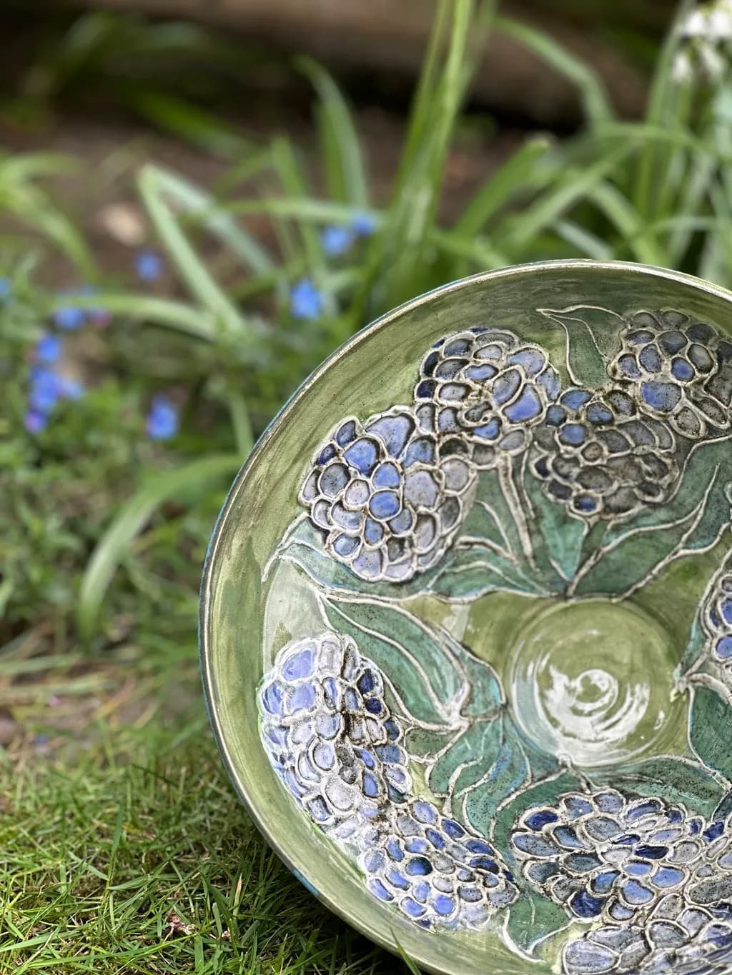 Whispers of Spring: Handcrafted Floral Bowl with Blue Accents and Leafy Elegance