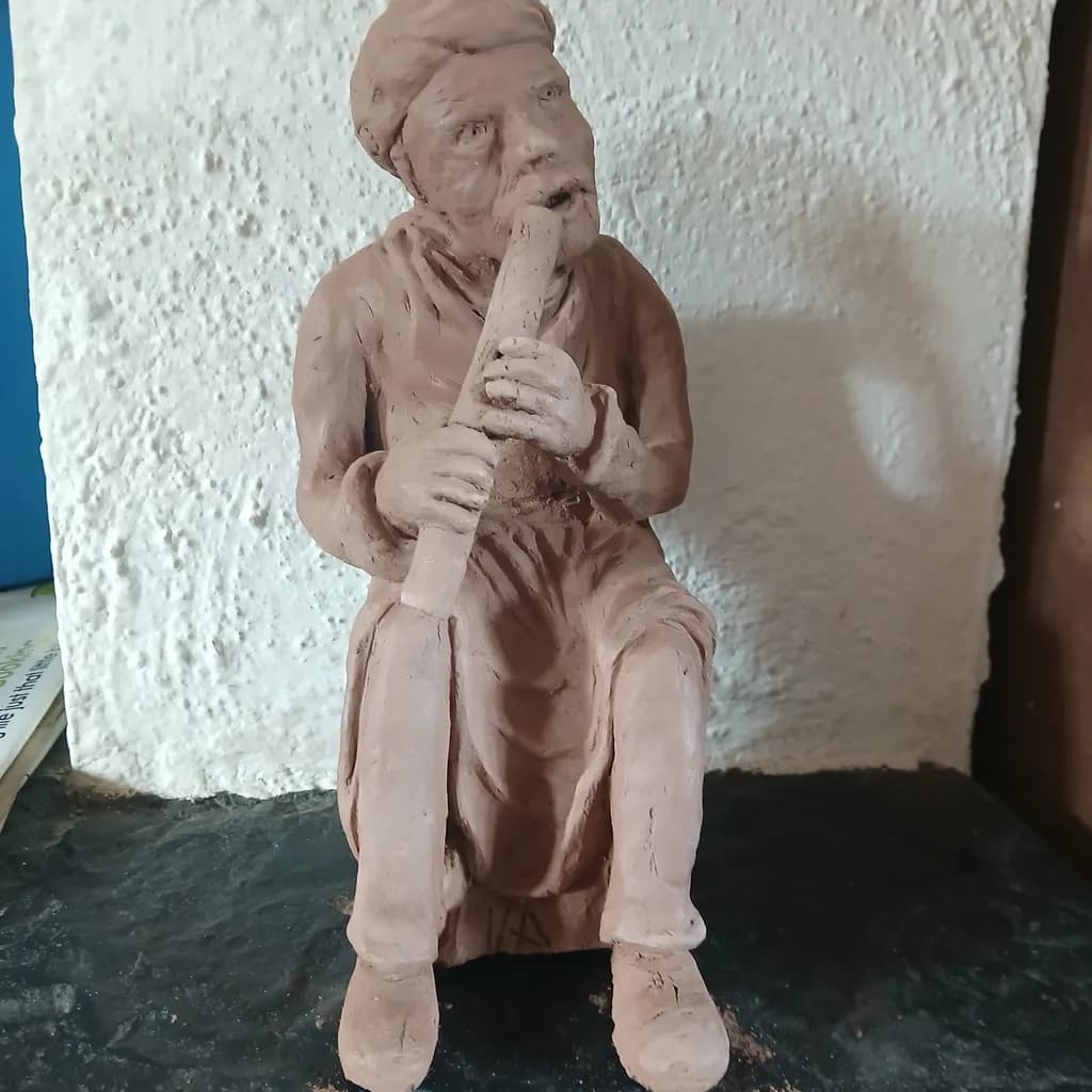 Whispers of Memory: A Clay Figure Capturing the Soulful Essence of Music and Humanity