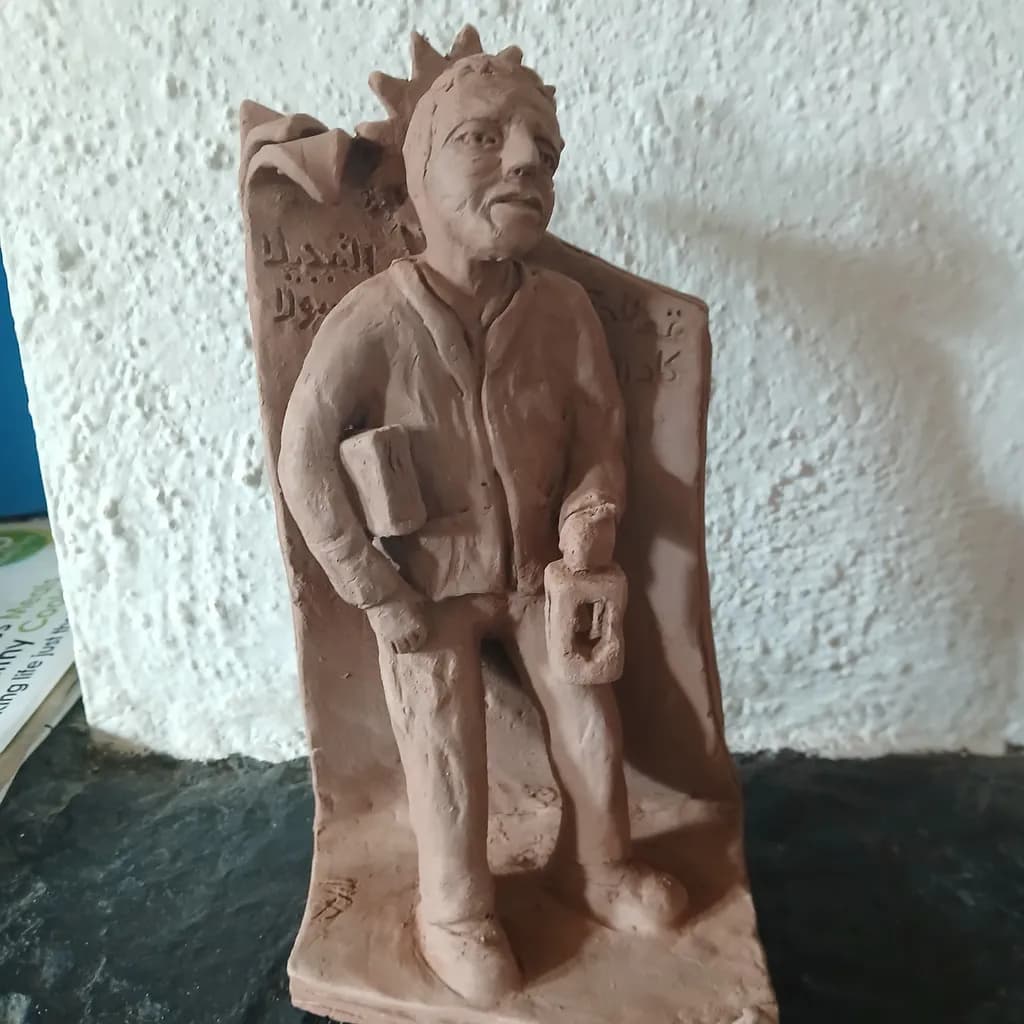 Resilient Spirit: A Clay Tribute to Human Experience and Imperfection