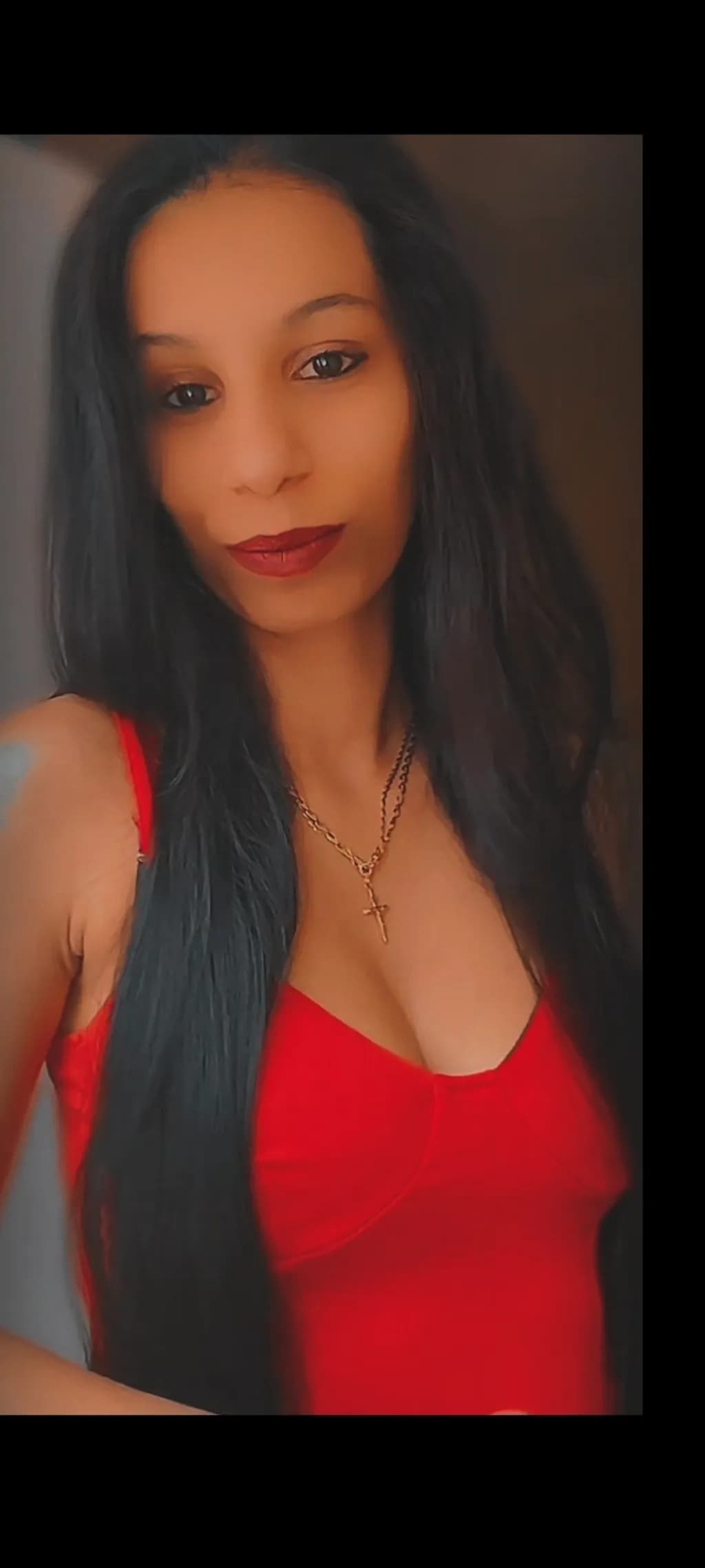 Radiant Elegance: A Portrait in Red and Gold