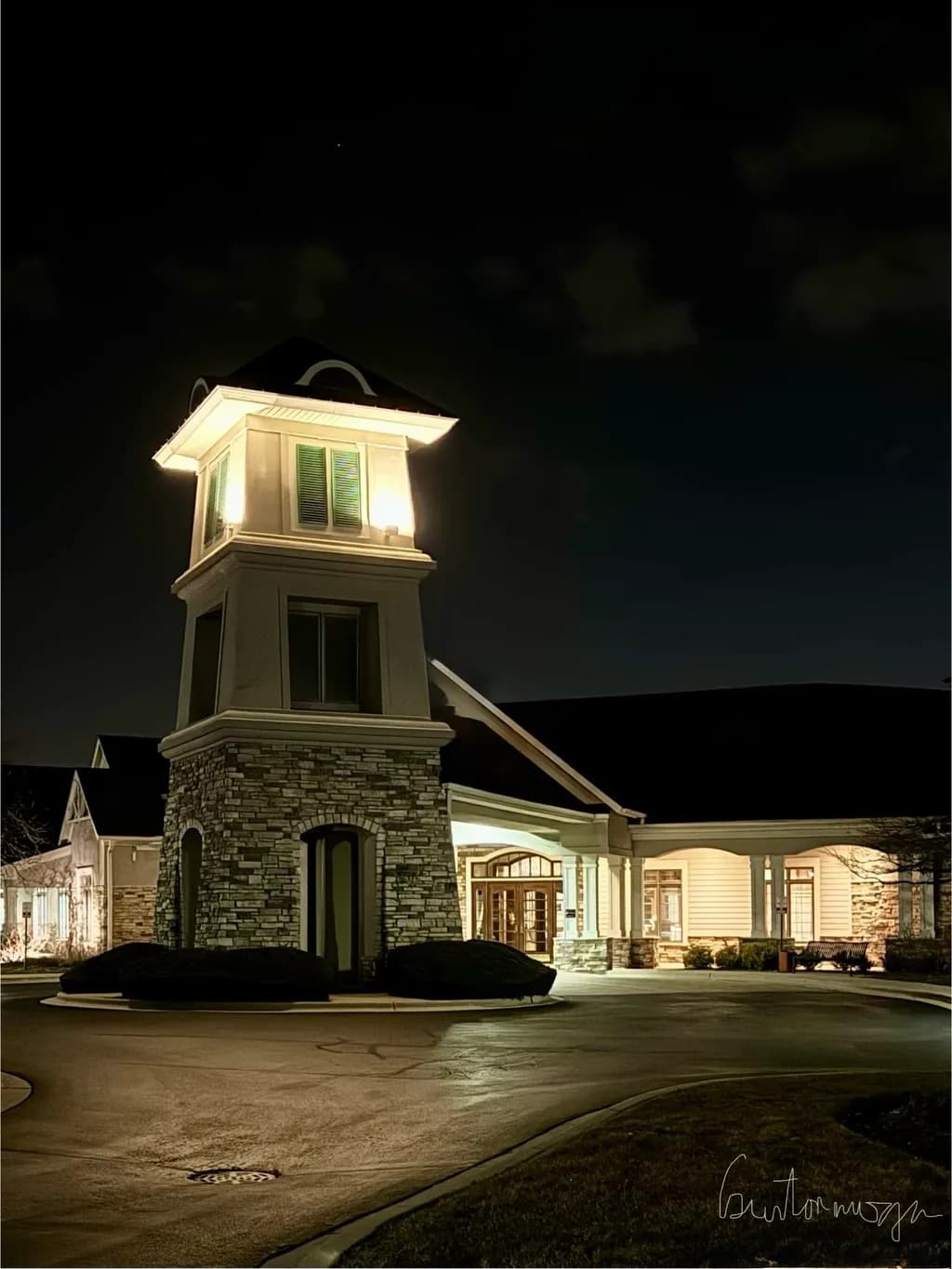 Serene Nightscape: Illuminated Architecture in Tranquil Darkness