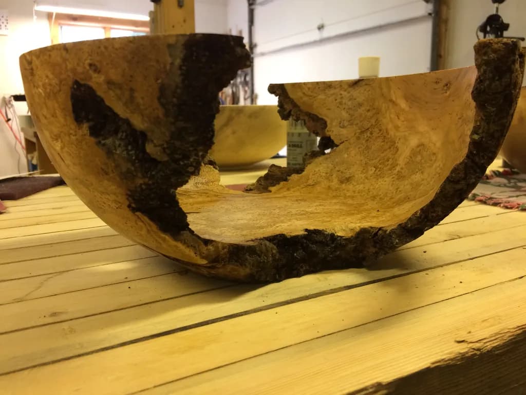Rustic Elegance: A Unique Handcrafted Wooden Bowl with Natural Charm