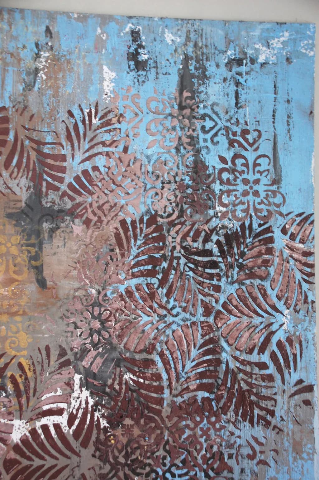 Whispers of Nature: A Vibrant Dance of Leaves and Patterns on Blue Canvas