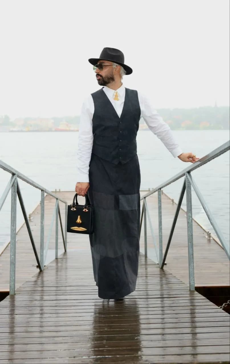 Urban Elegance: A Confident Stroll by the Waterfront in Fashionable Accessories