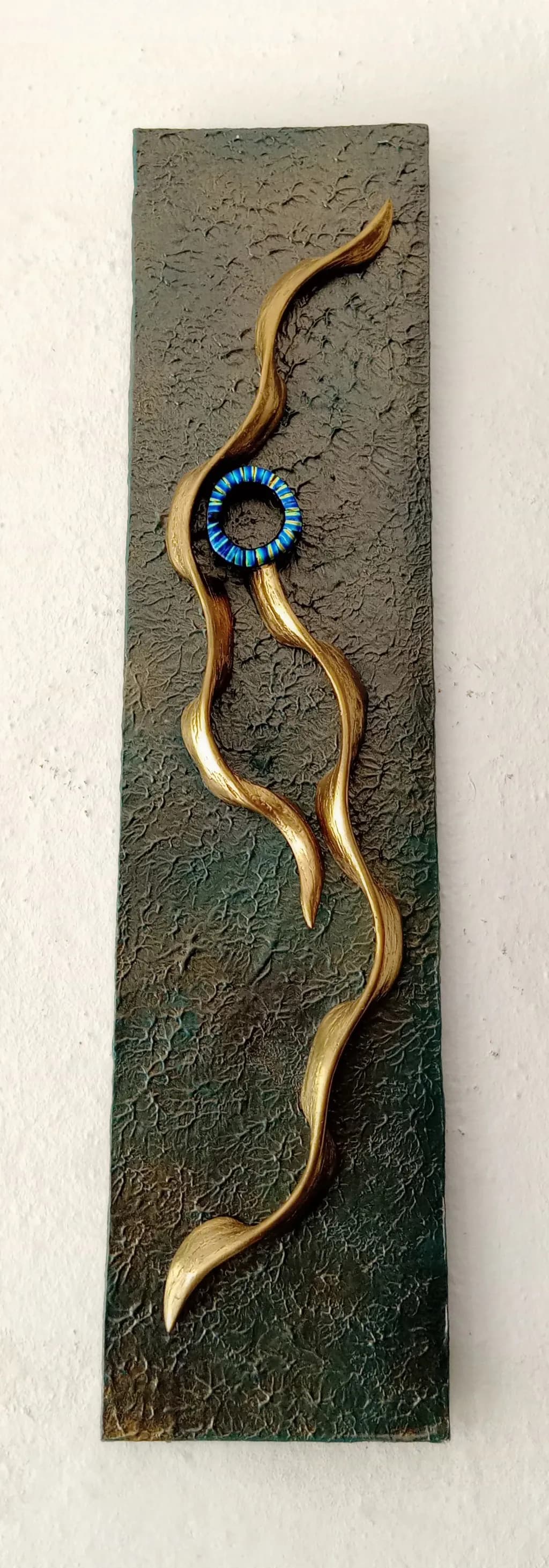 Golden Tendrils and Blue Ring
