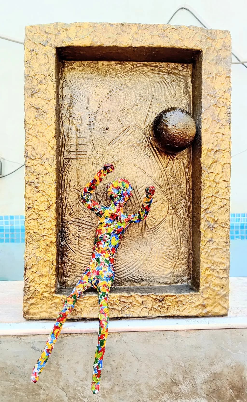 Colorful Figure Reaching for the Sphere