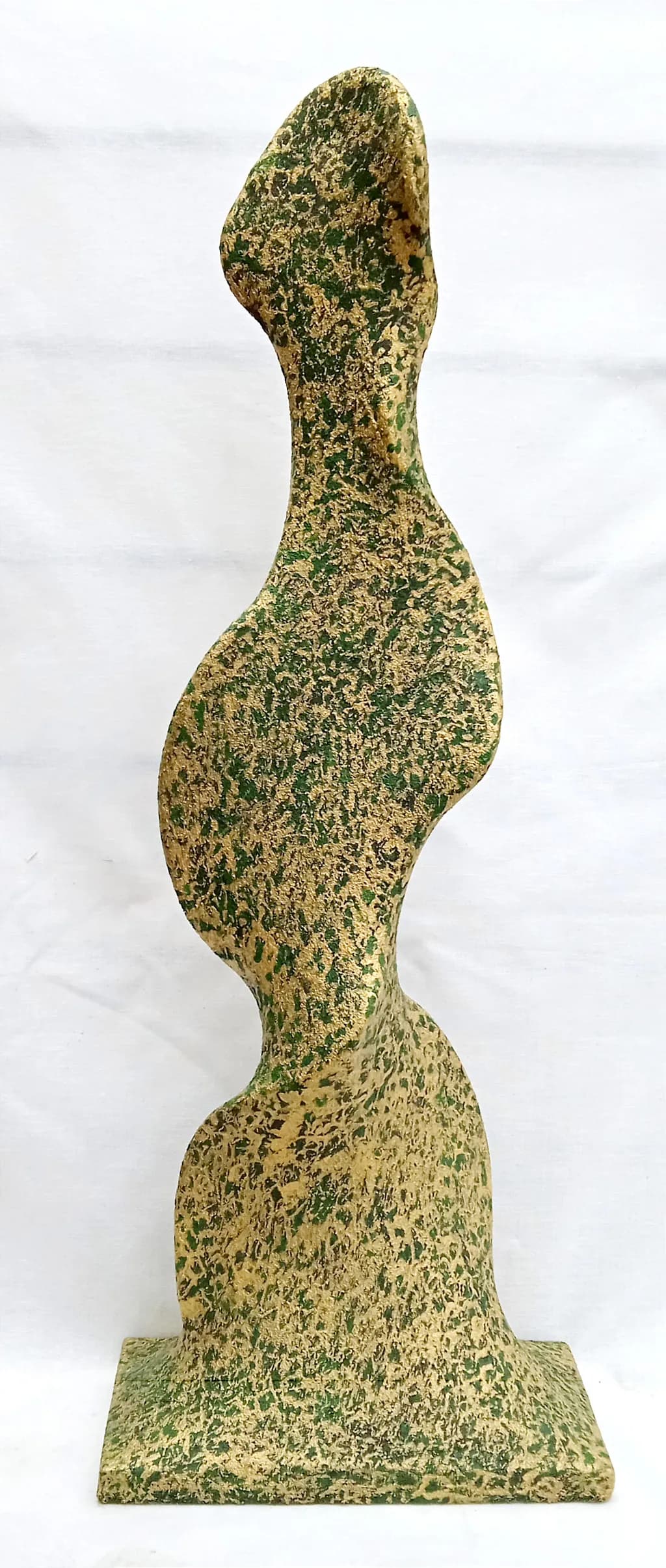 Curvaceous Harmony: An Abstract Green Sculpture Celebrating Form and Texture