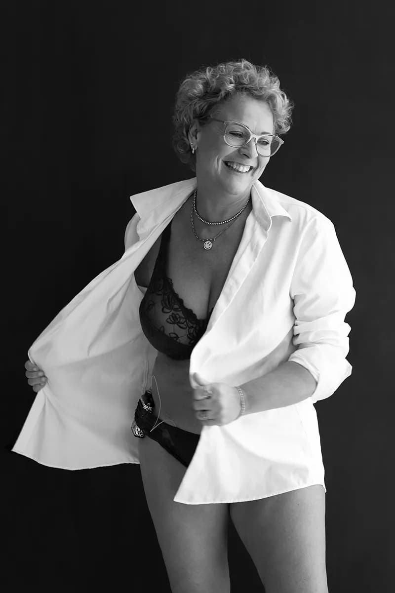 Embracing Confidence: A Playful Dance in Black and White