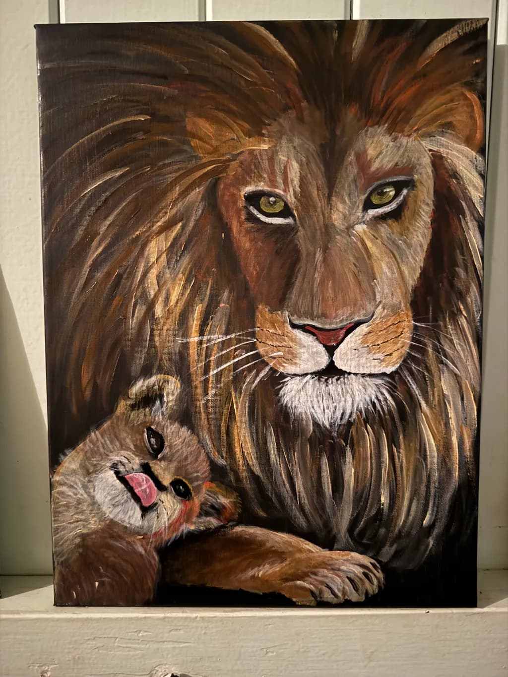 Majestic Bond: A Lion and Cub Embrace in Nature's Splendor