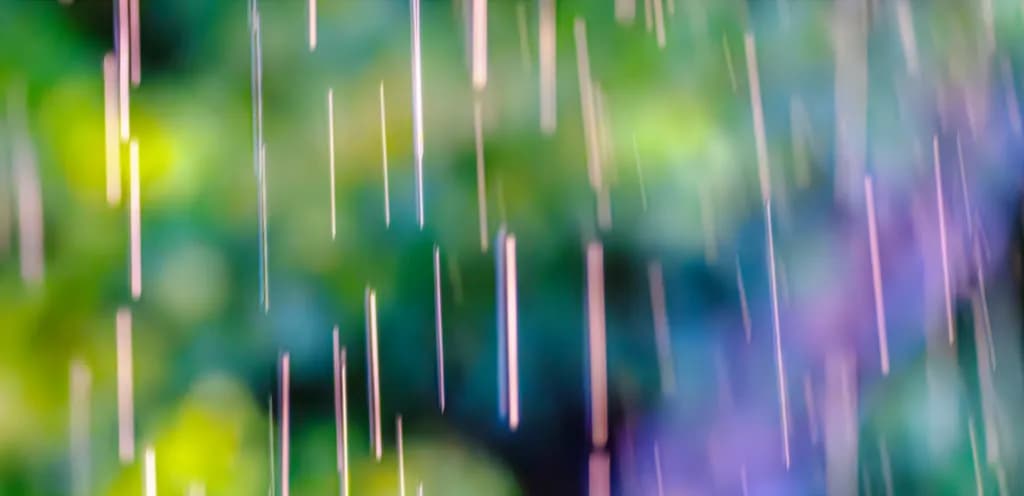Dancing Colors in a Rainy Blur: An Abstract Exploration of Nature's Light