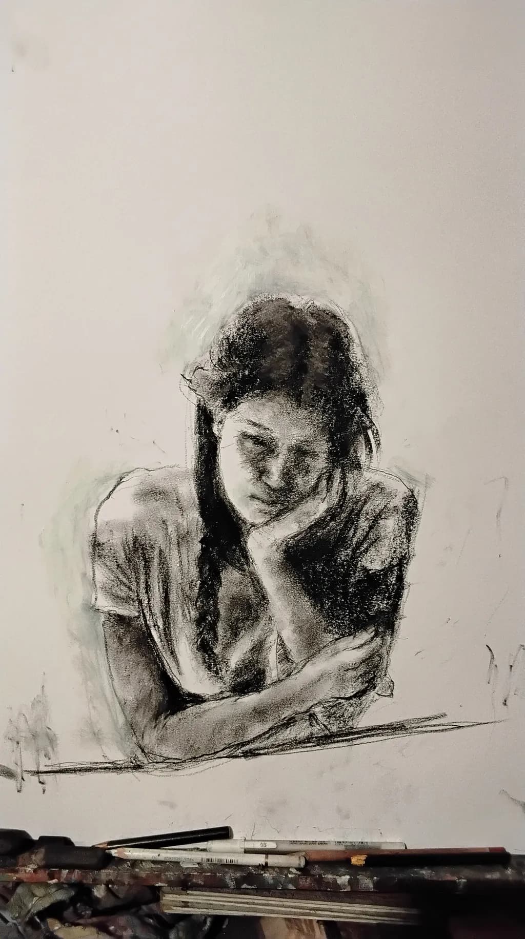 Whispers of Contemplation: A Charcoal Portrait of Reflection and Emotion