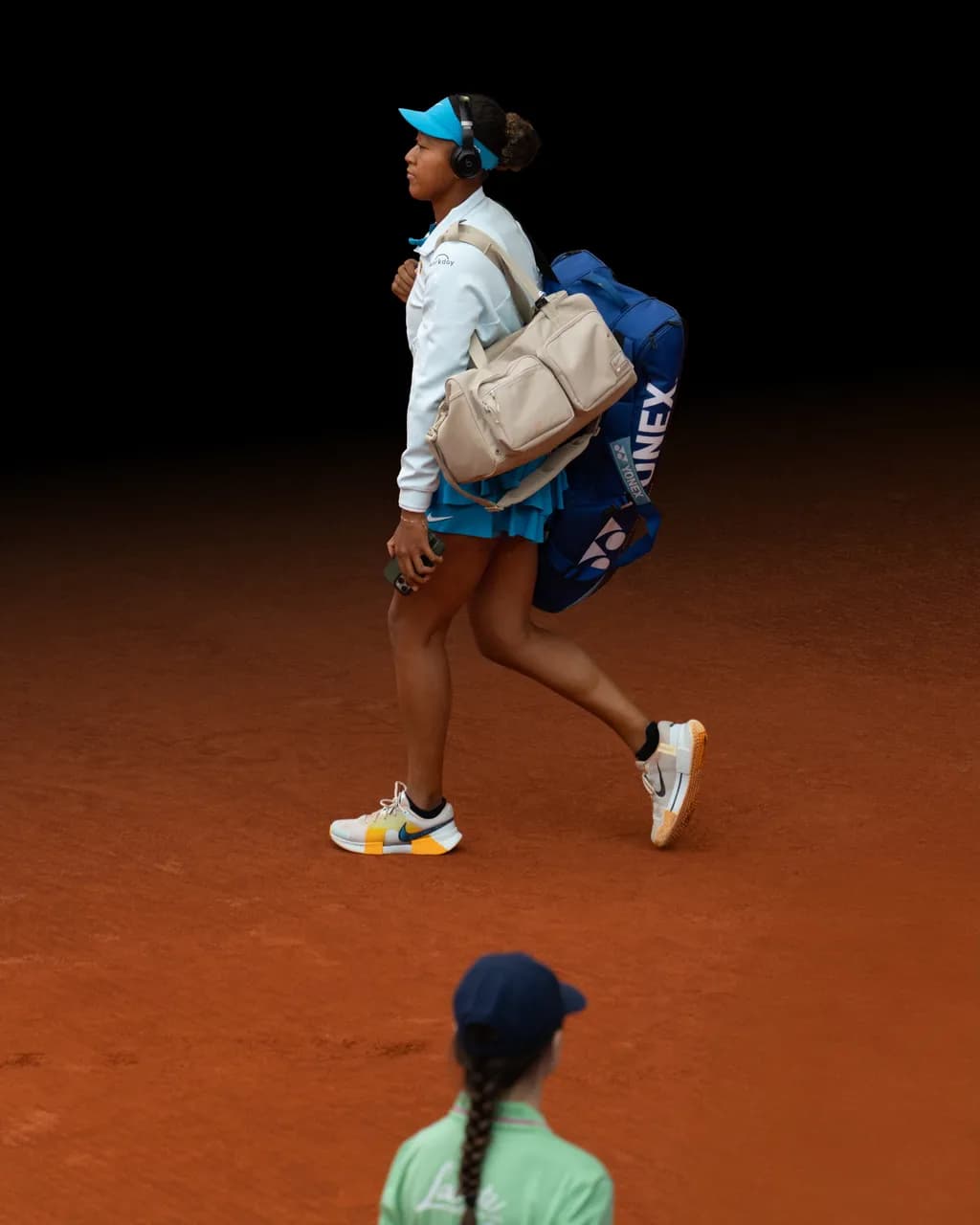 Walking the Court: A Moment of Focus and Determination in Tennis