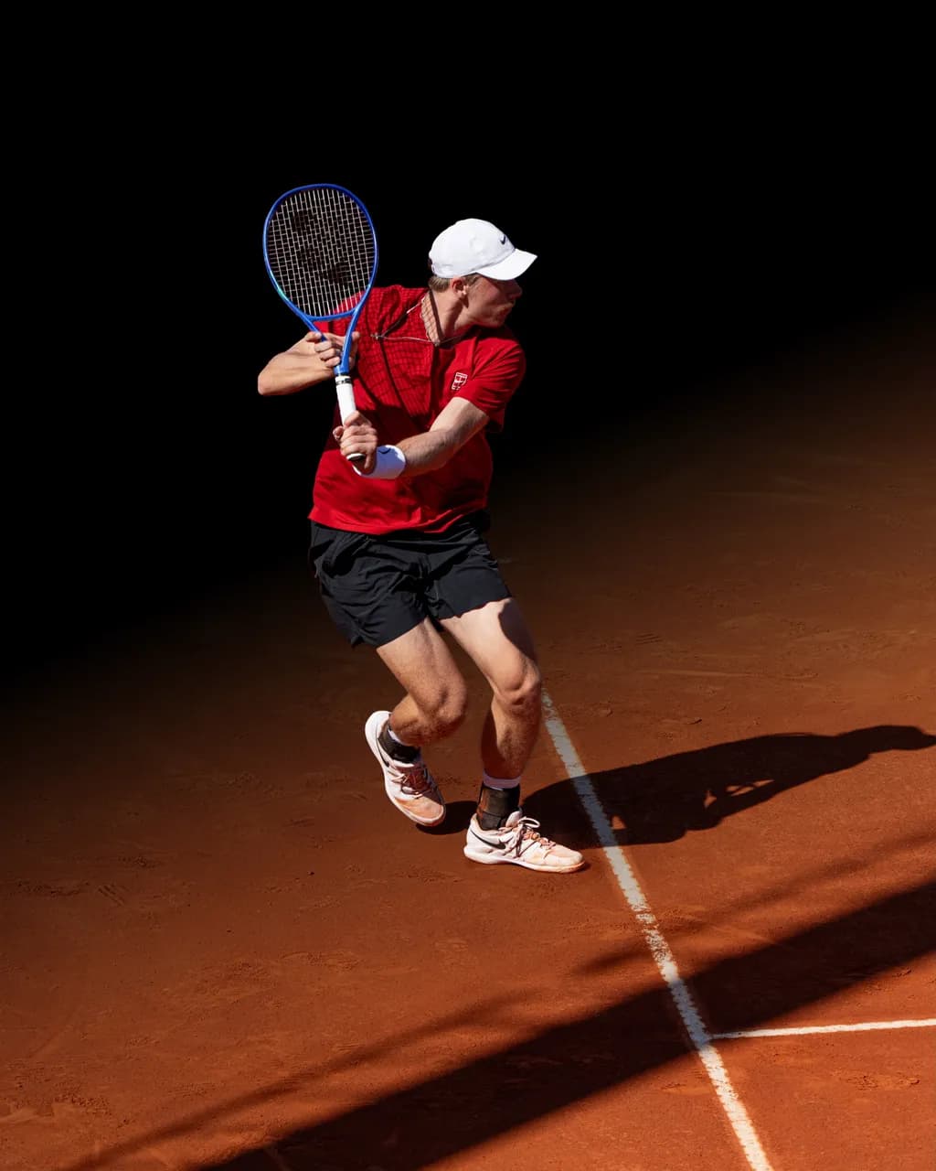 Dynamic Tennis Action: A Moment of Precision on the Clay Court