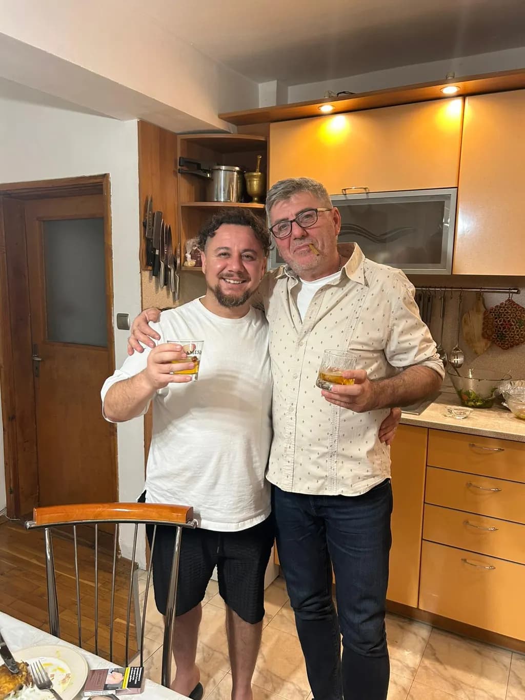 Cheers to Togetherness: A Heartwarming Moment in the Kitchen