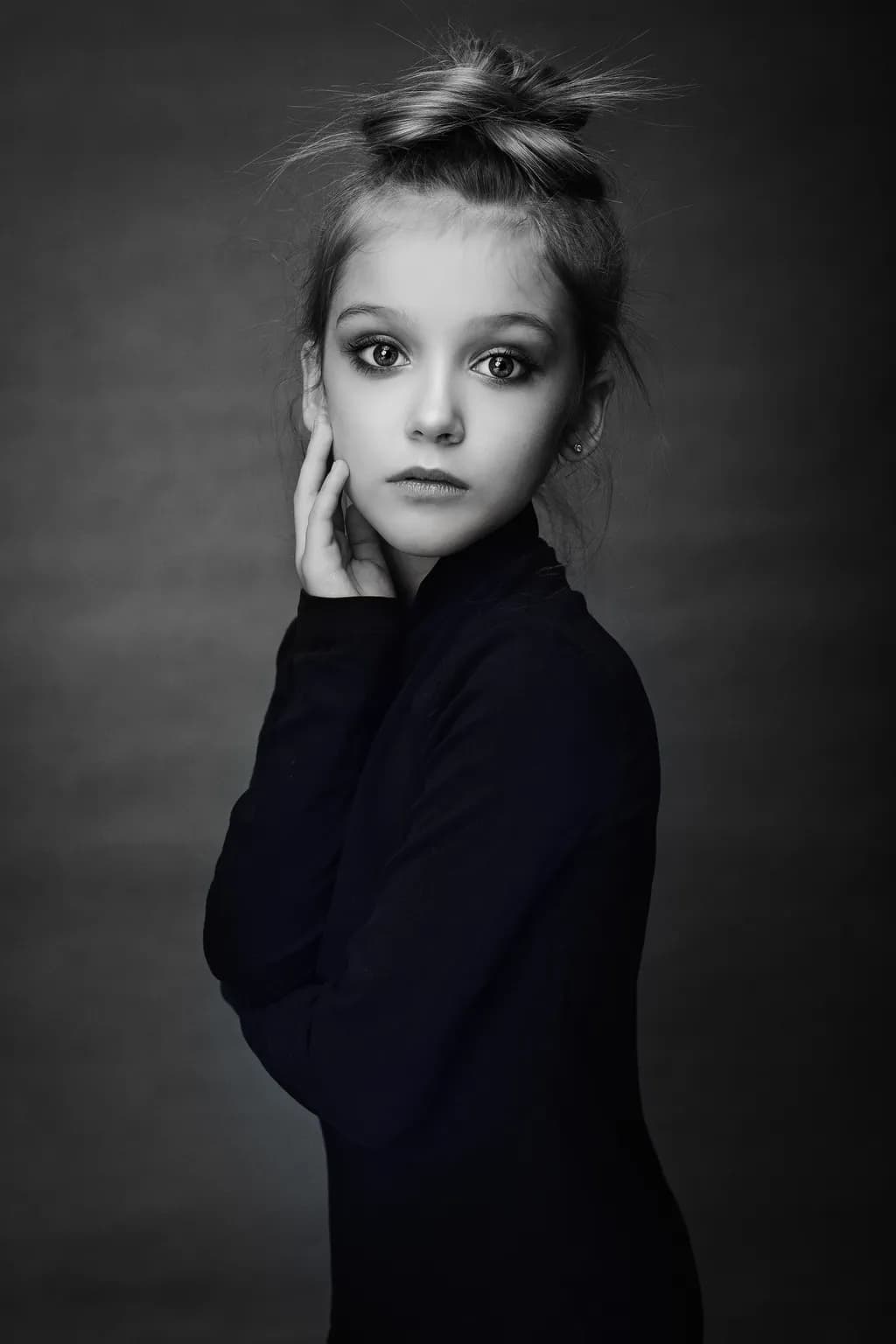 Whispers of Innocence: A Captivating Portrait of Youthful Elegance