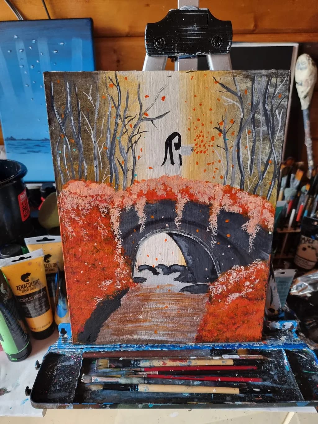 Autumn's Embrace: A Serene Bridge in a Colorful Landscape