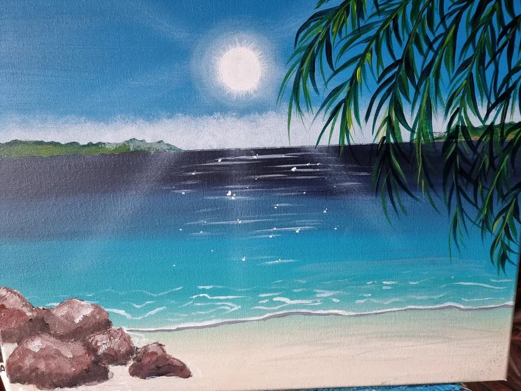 Serenity by the Shore: A Tranquil Seascape with Sunlit Waters and Gentle Waves