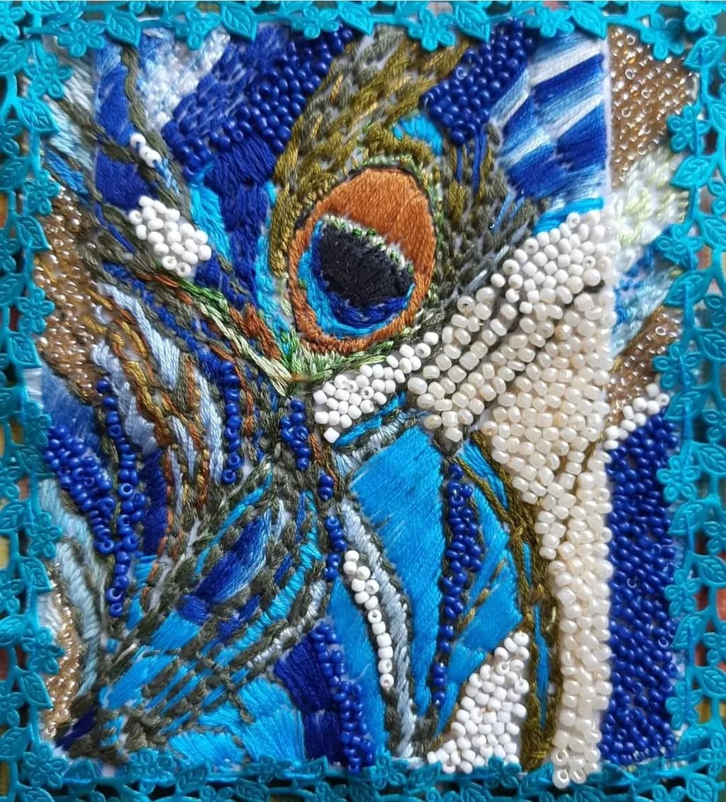 Vibrant Peacock Embroidery: A Colorful Tapestry of Texture and Artistry