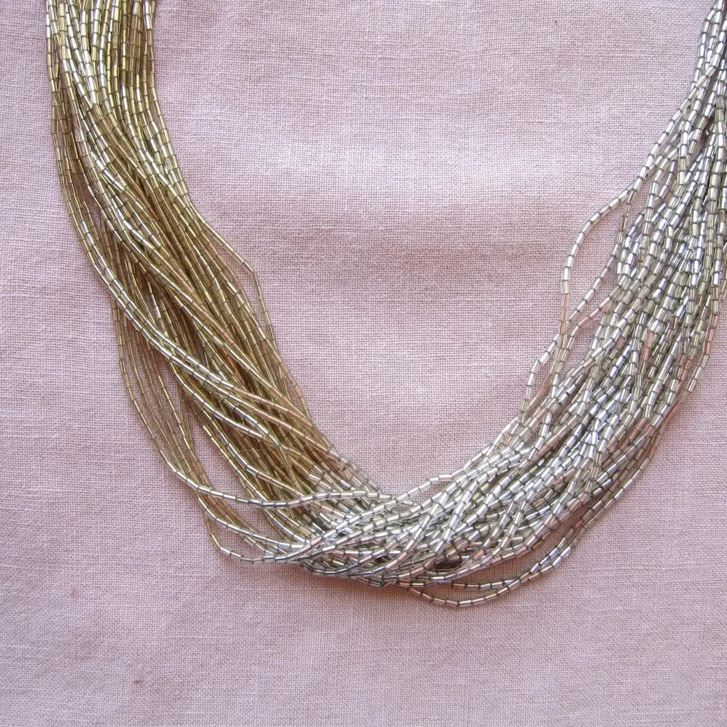 Golden Threads: A Symphony of Elegance in Beaded Design