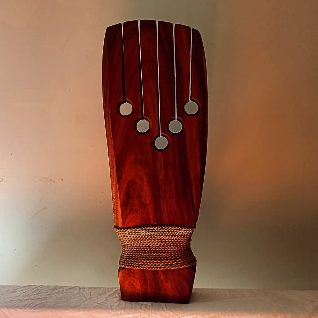 Harmonic Echo: A Handcrafted Wooden Kalimba with Elegant String Design