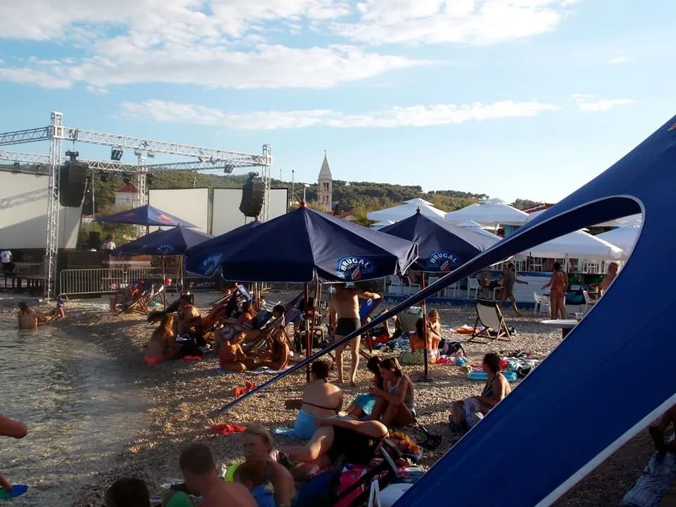 Summer Serenity: A Vibrant Beach Festival Experience by the Water