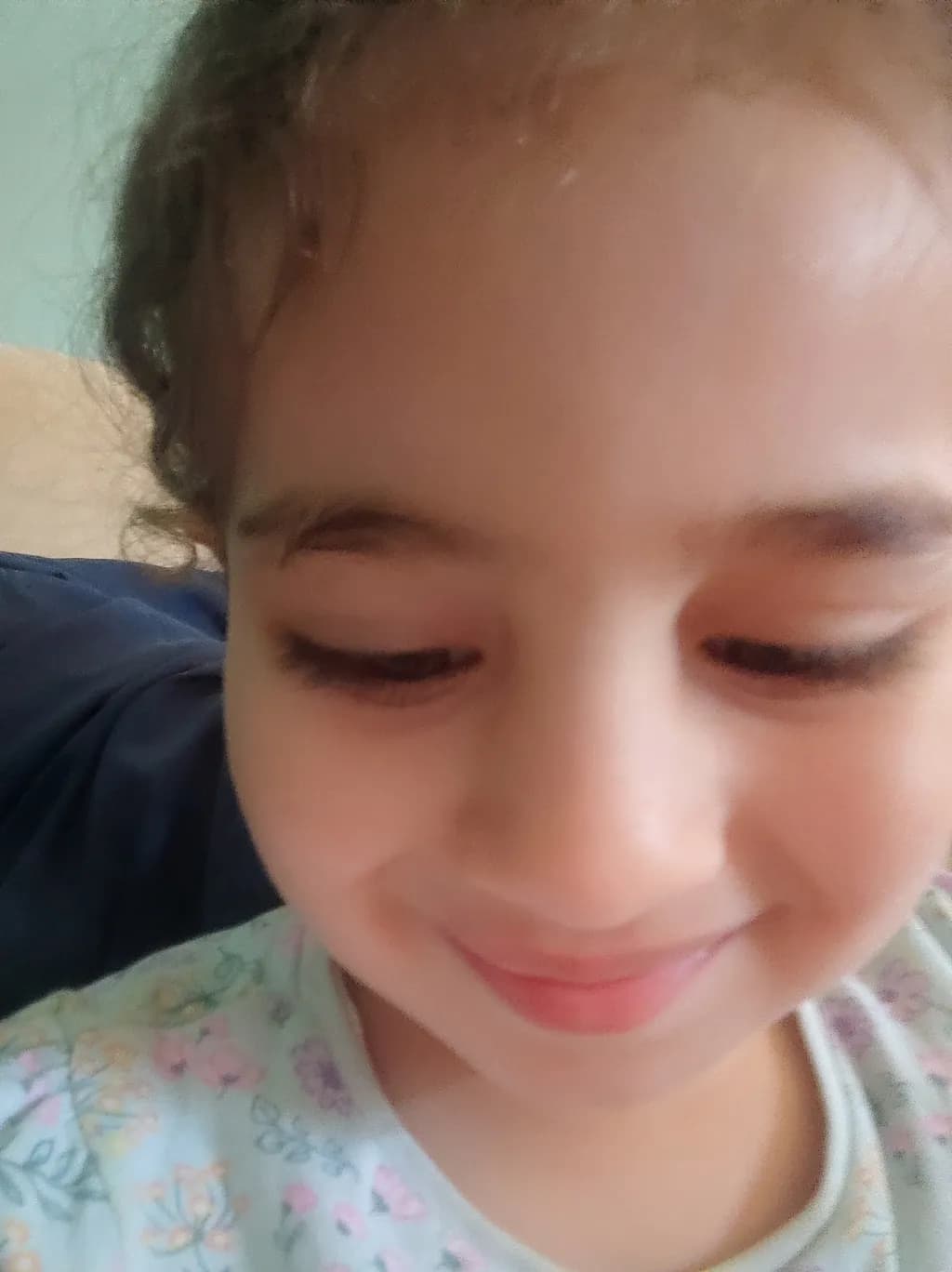 Whispers of Innocence: A Child's Joyful Moment Captured in Time