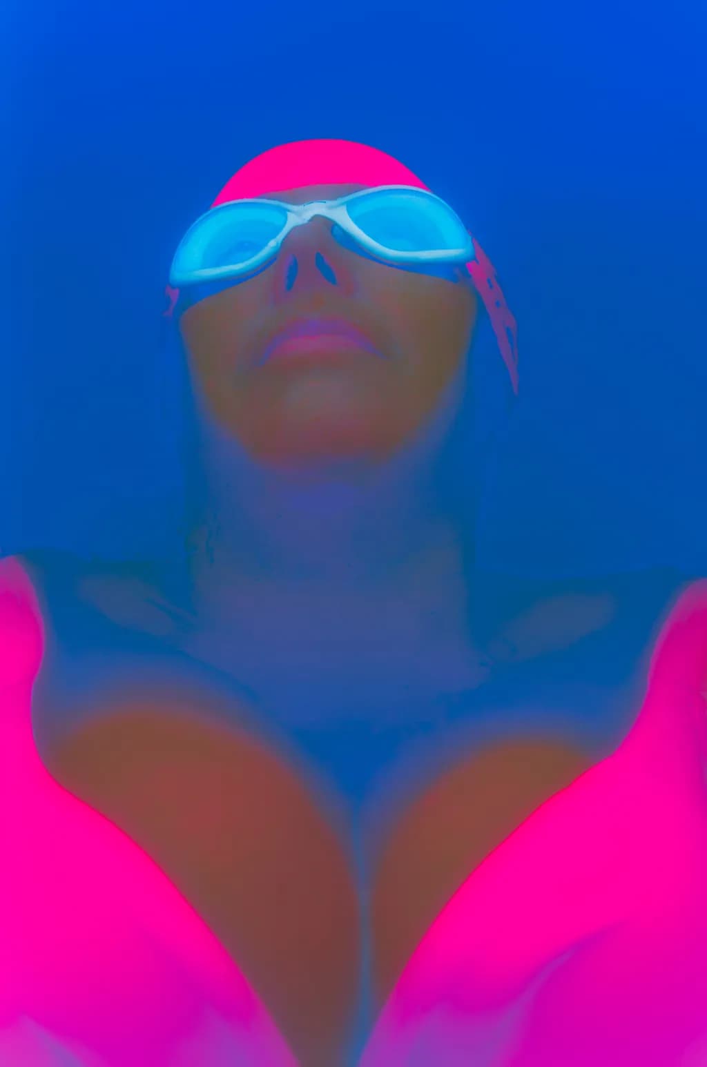 Diving into Dreams: A Surreal Exploration of Color and Form in Water Sports Photography