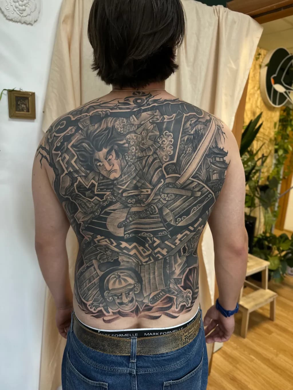 Epic Samurai Journey: A Masterful Back Tattoo Design Capturing Strength and Tradition