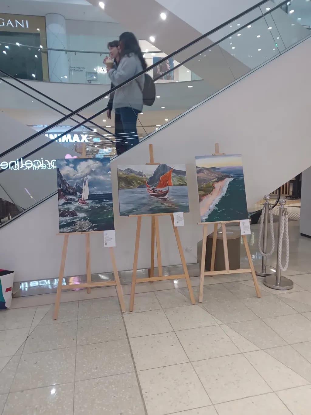 Serenity in Motion: A Modern Exhibition of Coastal Landscapes and Sailing Adventures