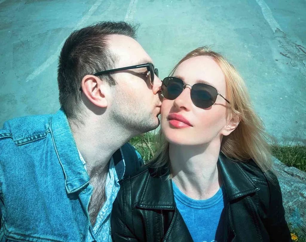 Whispers of Affection: A Sunlit Embrace in Shades of Love
