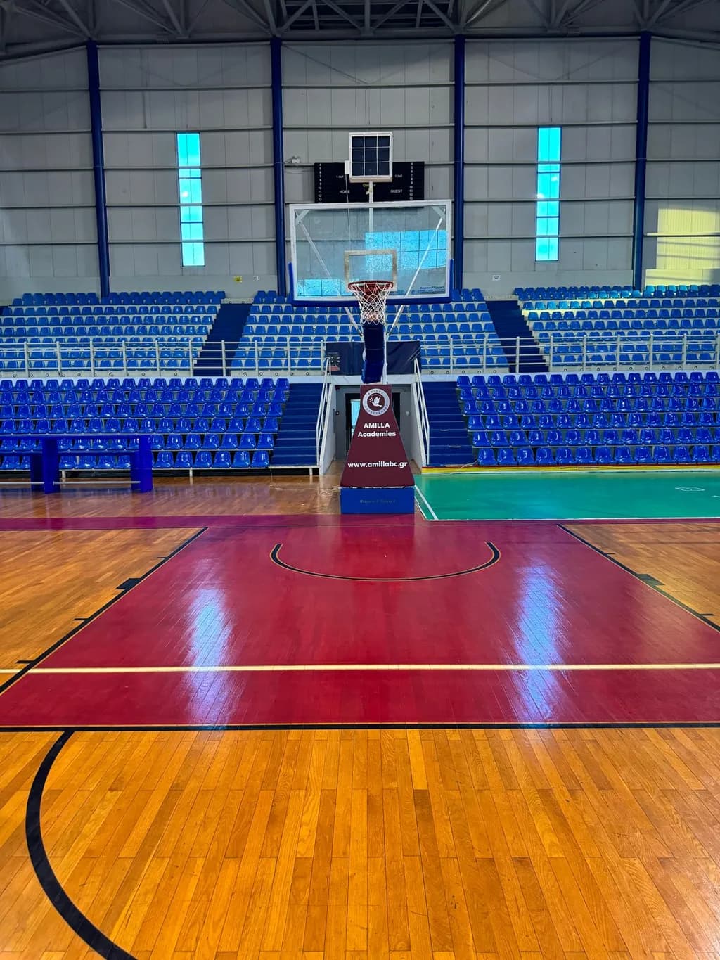 Echoes of the Court: A Serene Basketball Arena Perspective