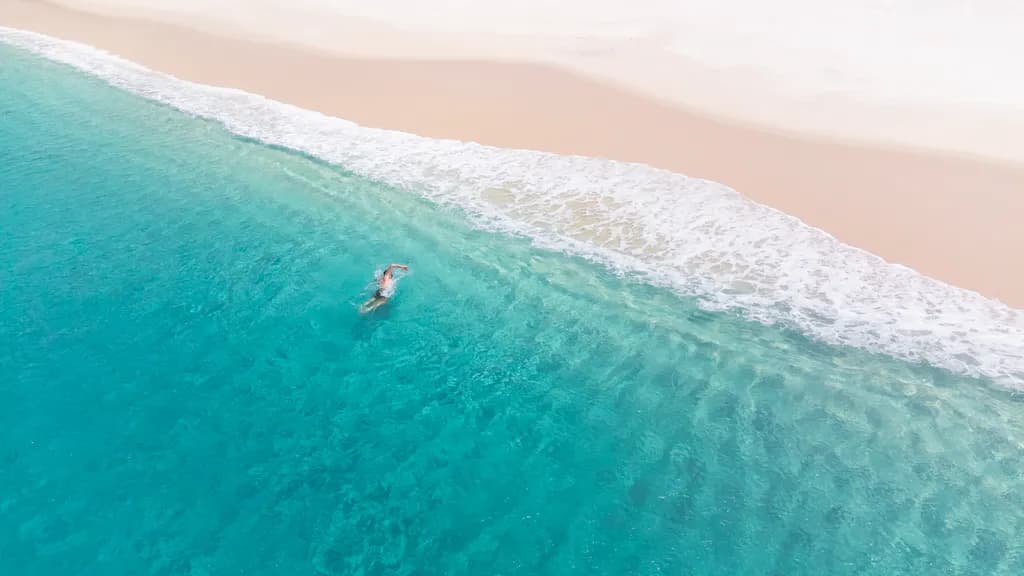Serenity in Aqua: A Tranquil Swim in Crystal Waters