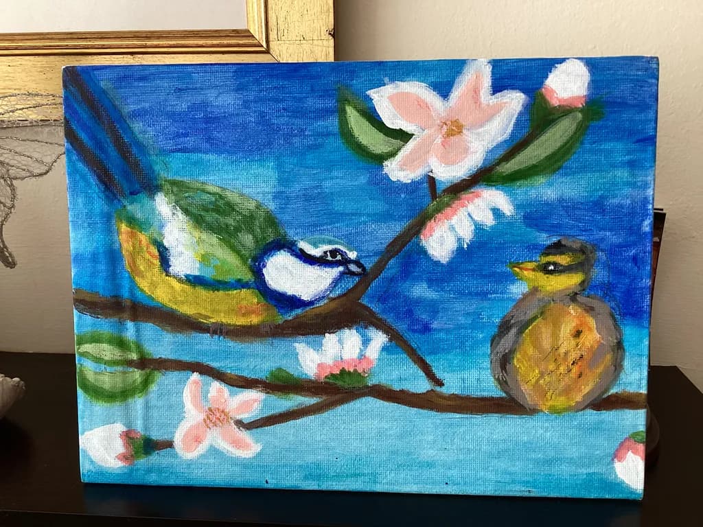 Whispers of Spring: A Colorful Encounter Between Birds and Blossoms
