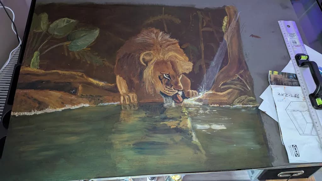 Majestic Reflection: A Lion's Serenade by the Water's Edge